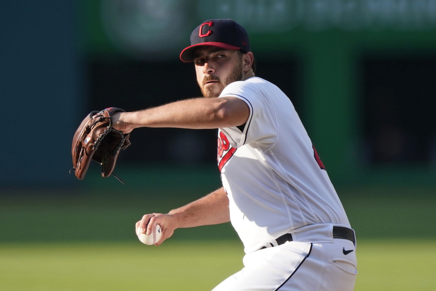 Cleveland Indians starting pitcher Aaron Civale delivers in the first inning of the team's baseball game against the Seattle Mariners, Friday, June 11, 2021, in Cleveland.