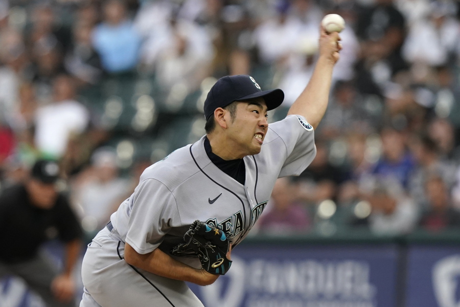 Seattle Mariners starting pitcher Yusei Kikuchi, of Japan, throws against the Chicago White Sox during the first inning of a baseball game in Chicago, Friday, June 25, 2021. (AP Photo/Nam Y.