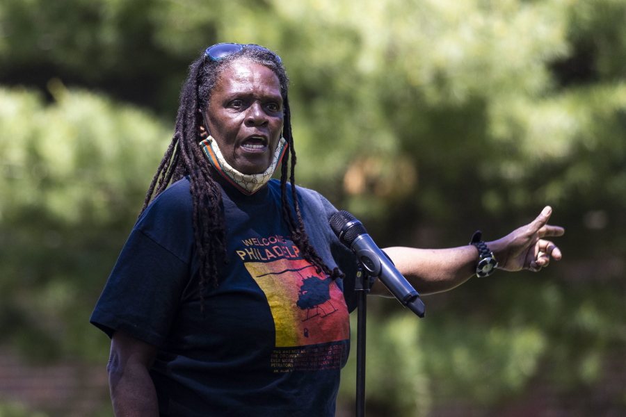 In this May 15, 2021 photo, Consuewella Africa, 69, speaks during a gathering for the 36th Anniversary of the MOVE Bombing in Philadelphia. Consuewella Dotson Africa, a longtime member of the Black organization MOVE and mother of two children killed in the 1985 bombing of the group's home in Philadelphia, died on Wednesday, June 16, 2021 in a hospital. She was 67.