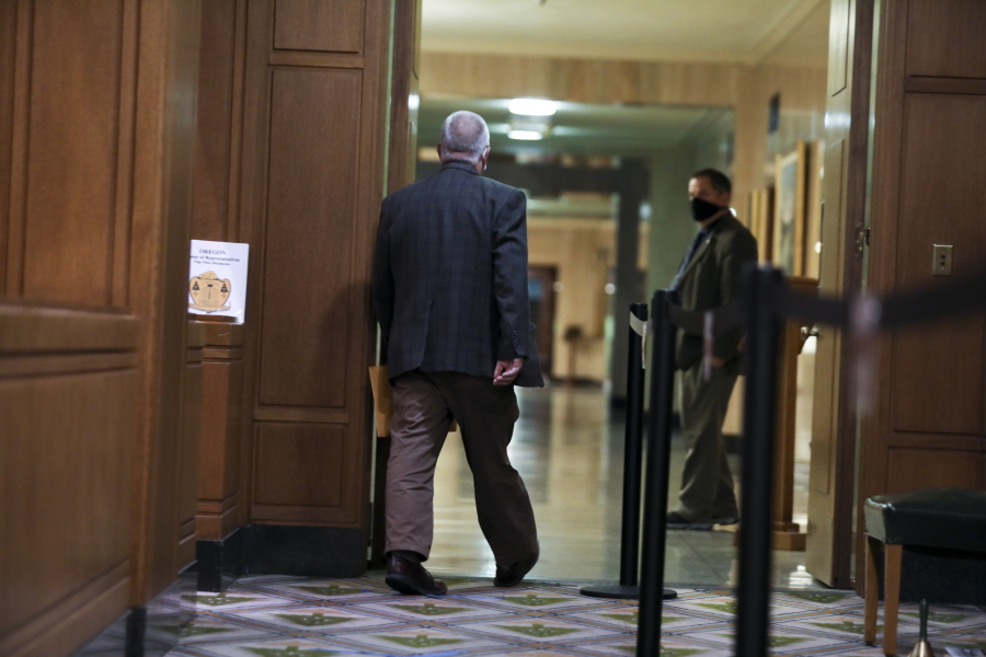 Rep. Mike Nearman leaves the House of Representatives after the vote to expel him at the Oregon State Capitol in Salem, Ore., on Thursday, June 10, 2021. Republican lawmakers voted with majority Democrats in the Oregon House of Representatives to take the historic step of expelling the Republican member who let violent, far-right protesters into the state Capitol on Dec. 21.