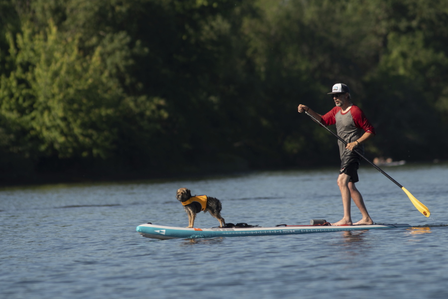 As a heat wave cooked Portland on Friday, June 25, 2021, water-seekers took to the Willamette River for relief. Jet skis, speed boats, paddle-boards, sailors and beachgoers could be seen stretching from the Hawthorne Bridge to the south of Ross Island.