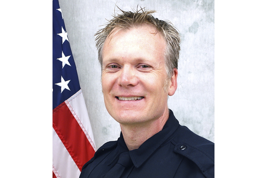 In this undated photo provided by the Arvada Police Department shows Officer Gordon Beesley. Beesley was working patrol, Monday, June 21, 2021,  when police say he was hit by gunfire shortly after a report of a "suspicious incident" near the library in Arvada, Colo.