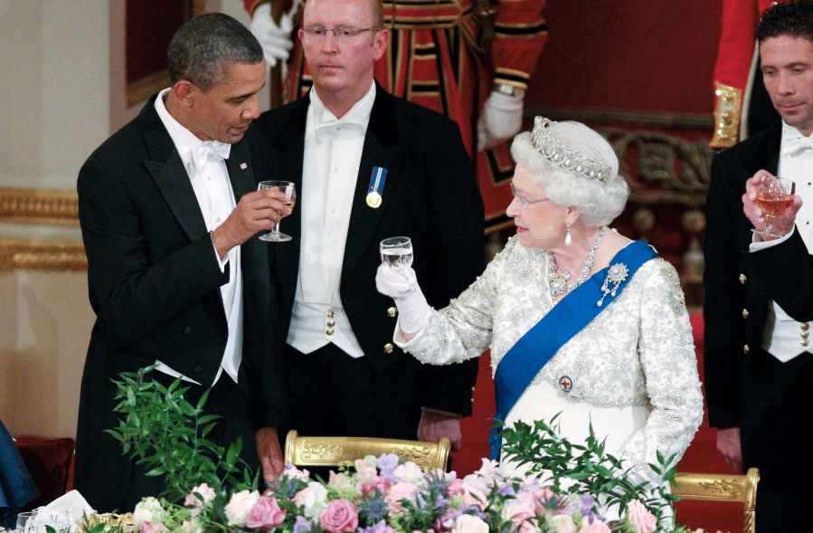 FILE - In this May 24, 2011, file photo Queen Elizabeth II, and U.S. President Barack Obama attend a state banquet in Buckingham Palace, London.