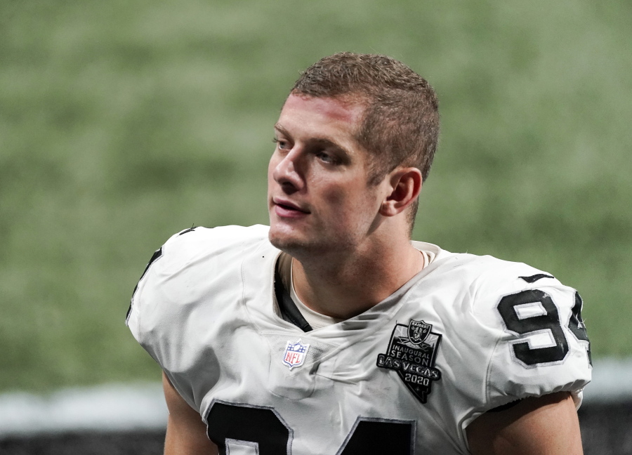 FILE - In this Nov. 29, 2020, file photo, Las Vegas Raiders defensive end Carl Nassib leaves the field after an NFL football game against the Atlanta Falcons in Atlanta. Nassib on Monday, June 21, 2021, became the first active NFL player to come out as gay.