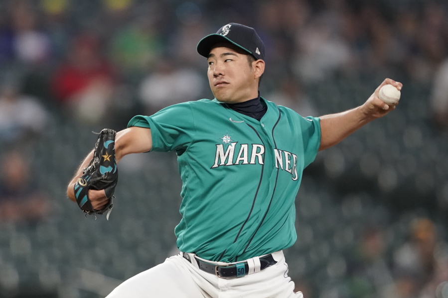 Seattle Mariners starting pitcher Yusei Kikuchi throws to a Tampa Bay Rays batter during the sixth inning of a baseball game Friday, June 18, 2021, in Seattle. (AP Photo/Ted S.
