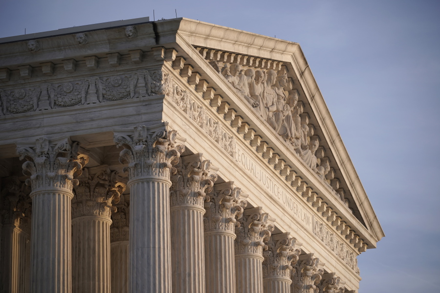FILE - In this Nov. 5, 2020, file photo the Supreme Court is seen in Washington. With abortion and guns already on the agenda, the conservative-dominated Supreme Court is considering adding a third blockbuster issue -- whether to ban consideration of race in college admissions.  (AP Photo/J.