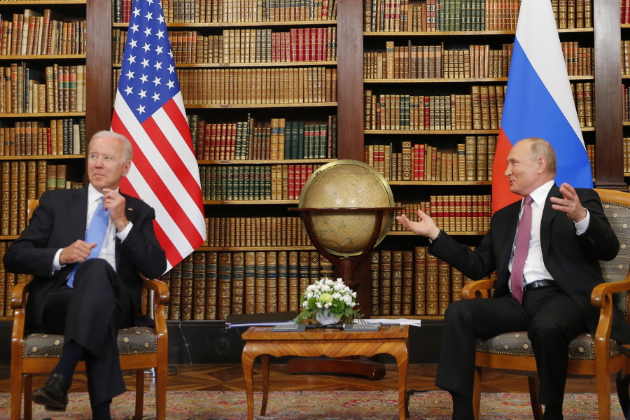 U.S. President Joe Biden, left, and Russia's President Vladimir Putin, right, meet for the U.S.-Russia summit at Villa La Grange in Geneva, Switzerland, Wednesday, June 16, 2021.