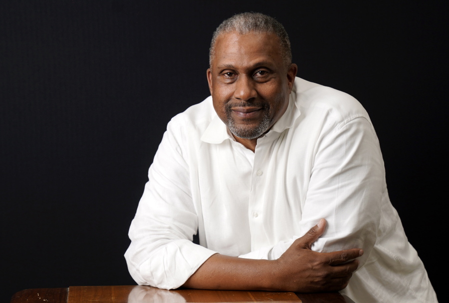 Tavis Smiley, owner of progressive talk radio station KBLA Los Angeles (1580), poses for a portrait, Tuesday, June 15, 2021, in Los Angeles.