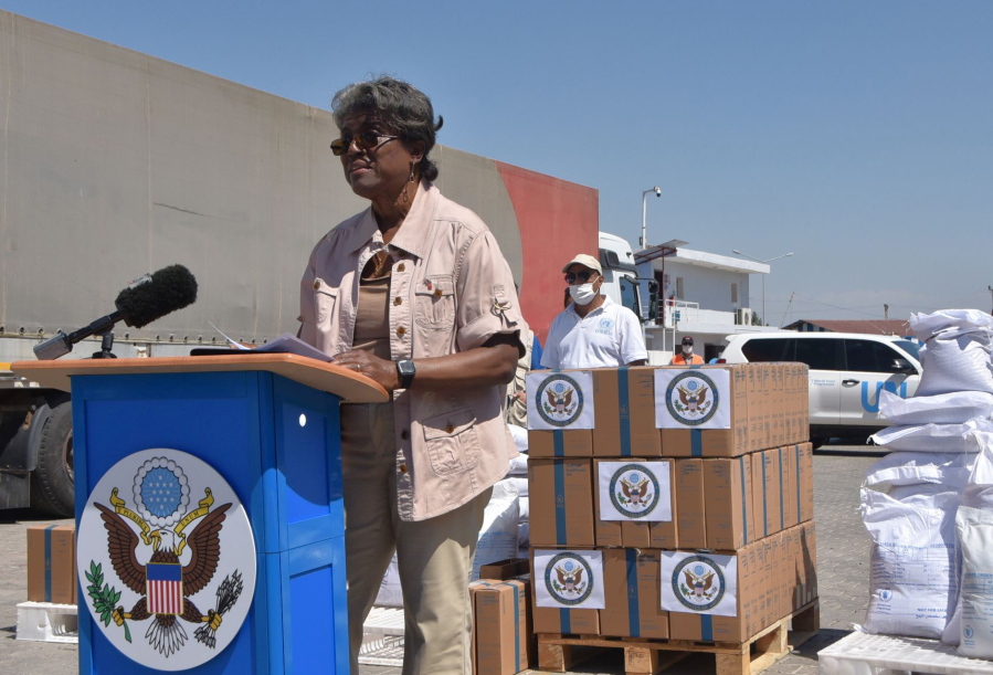 In this handout photo provided by the US Embassy in Turkey, Linda Thomas-Greenfield, U.S. Ambassador to the United Nations, speaks at the Bab al-Hawa border crossing between Turkey and Syria, Thursday, June 3, 2021. Thomas-Greenfield announced on Thursday nearly $240 million in humanitarian funding to support the people of Syria, Syrian refugees and countries hosting them, and called for access through international crossings to allow the delivery of aid. Linda Thomas-Greenfield made the announcement during a visit to the Bab al-Hawa border crossing between Turkey and Syria -- the sole remaining point of access for humanitarian aid to enter the conflict-ravaged country.