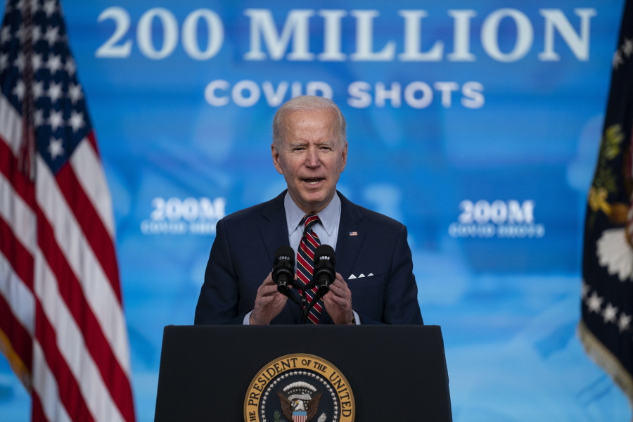 FILE - In this April 21, 2021, file photo, President Joe Biden speaks about COVID-19 vaccinations at the White House, in Washington. In April, the Biden administration announced plans to share millions of vaccine doses with the world by the end of June.