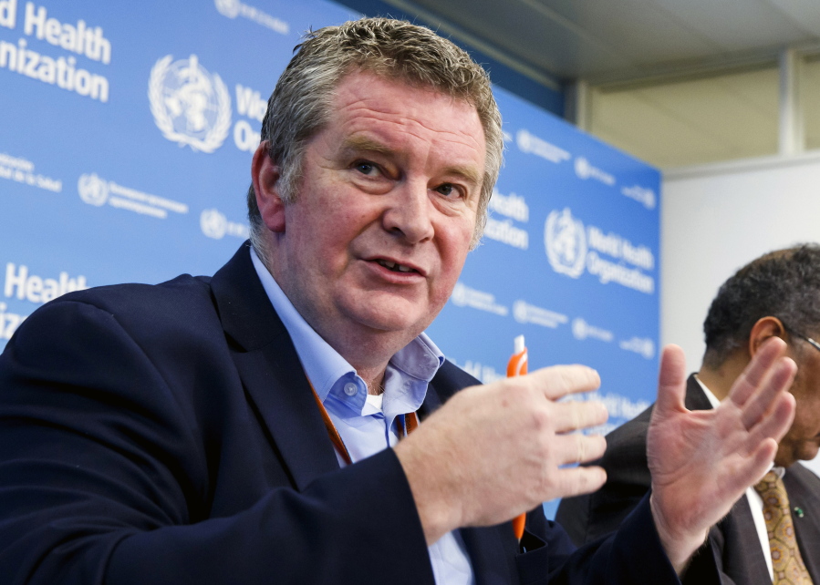 FILE - In this Wednesday, Feb. 5, 2020 file photo, Dr. Michael Ryan, executive director of the World Health Organization's Health Emergencies program, speaks during a news conference at the WHO headquarters in Geneva, Switzerland.  Top World Health Organization official Dr. Michael Ryan, said Monday June 7, 2021, he estimates that worldwide COVID-19 vaccination coverage of over 80% is needed to significantly lower the chance that an imported coronavirus case could spawn a cluster or a wider outbreak.
