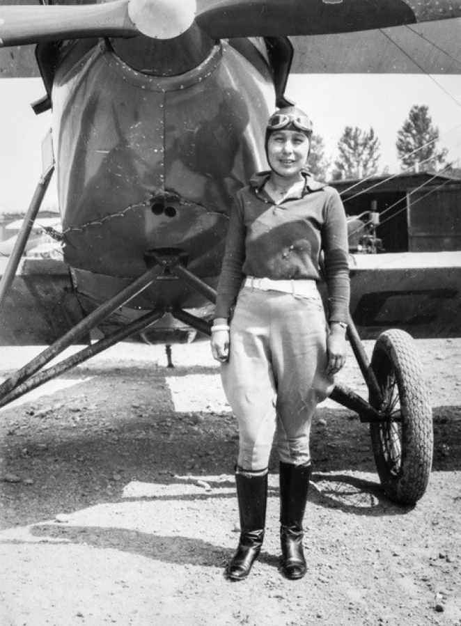 The first Native American woman to gain a pilot's license, the quiet and reserved Mary Riddell became a parachutist, barnstormer and daredevil. Shown here about 1930, she was known as the "parachuting stewardess" when traveling the West on the plane Voice of Washington. Throughout the 1930s, she demonstrated daring athletic skill performing skydiving, swimming and motorcycle stunts.