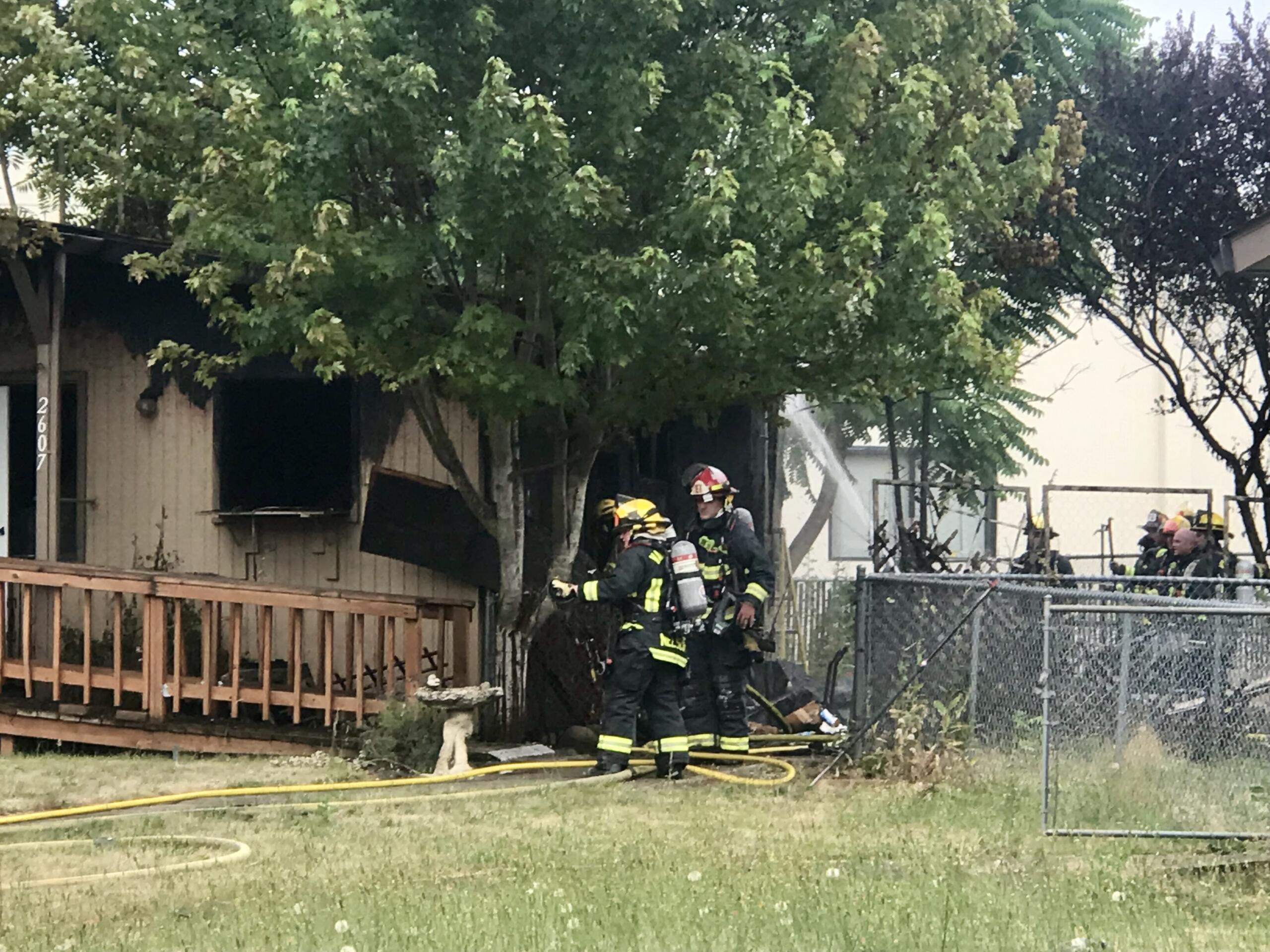 Vancouver firefighters were dispatched at 5:17 p.m. for a report of a residential structure fire at 2607 E. 21st St. The caller reported flames and smoke coming from the front windows of the residence.
