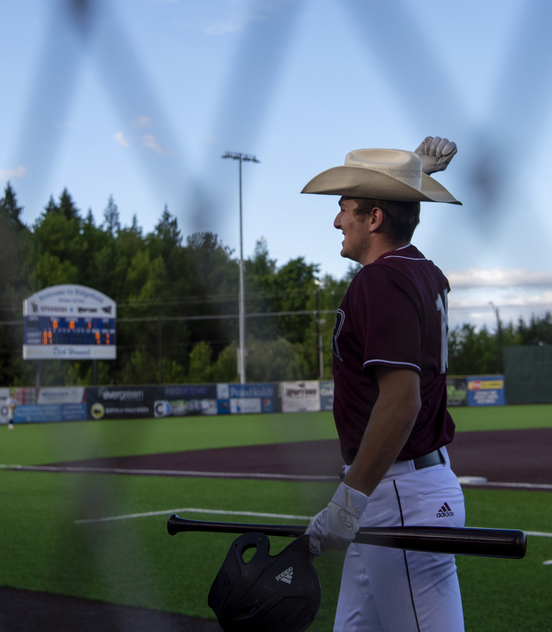 Ridgefield's Kody Darcy pretends to use a lasso while putting on a home run hat after clearing the center-field fence in the second inning in a West Coast League baseball game on Tuesday, June 8, 2021, at the Ridgefield Outdoor Recreation Complex. Ridgefield won 6-3 to improve to 4-0 on the season.