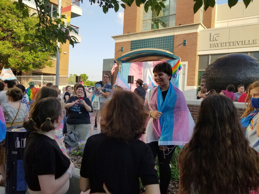 Alex Churchman takes part in a trans march and rally in Arkansas. The 13-year-old says he found support from Seattle-based Beloved Arise, an organization for queer youth of faith around the country and world, when he felt rejected by his church.
