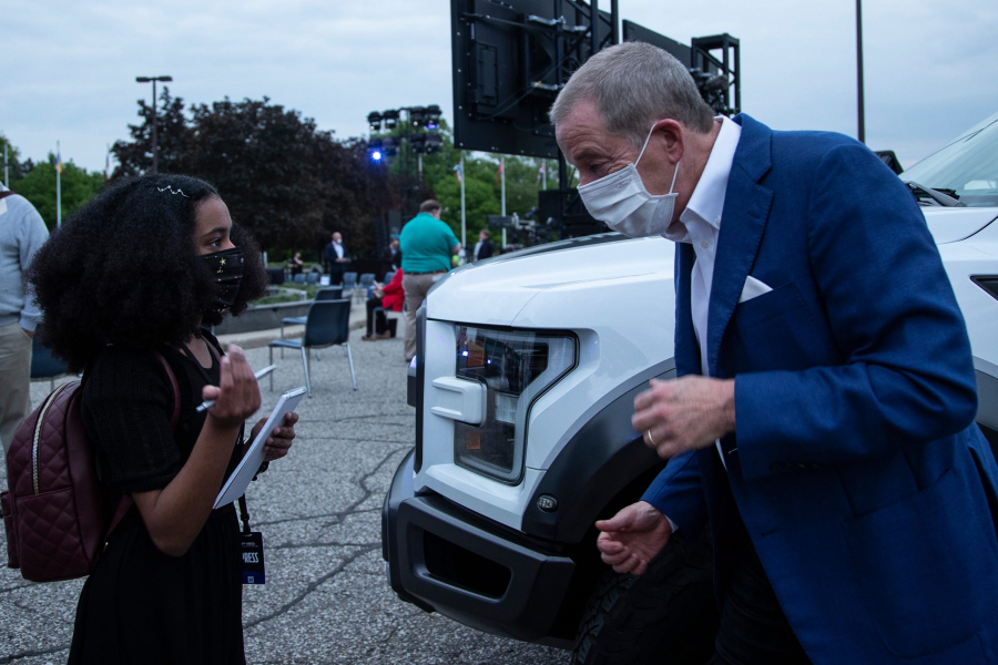 Allegra Blackwood, 13, interviews Bill Ford, executive chair of Ford Motor Co., at Ford World Headquarters in Dearborn, Michigan before the F-150 Lightning reveal on May 19, 2021.