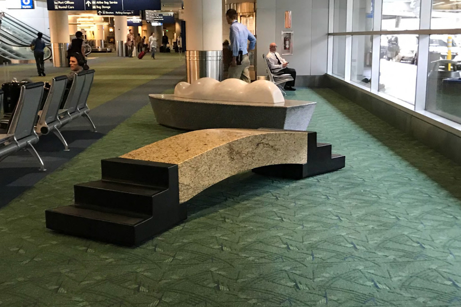 VANCOUVER: A bridge, seen in the foreground, and a boat in the background, both made of Indian granite and Italian marble by artist Larry Kirkland, will be moved from their longtime home at the Portland International Airport later this summer.