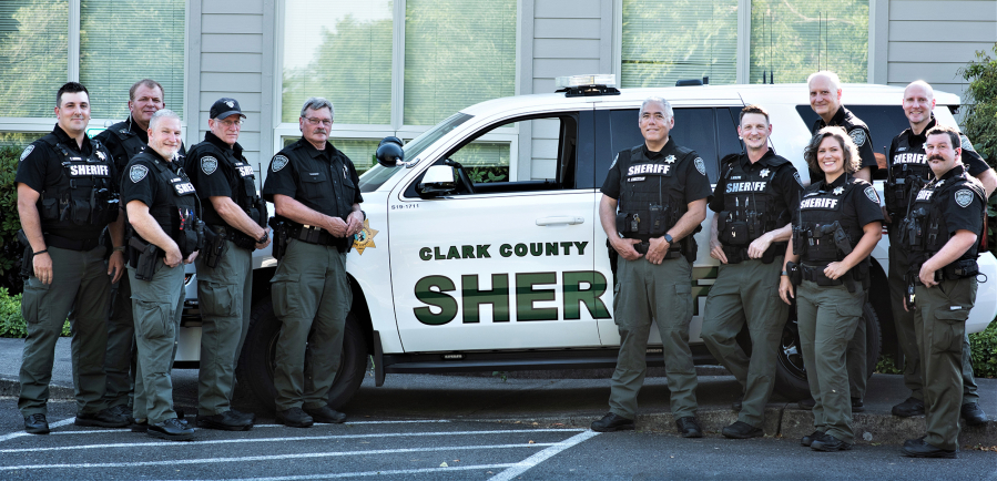 FAIRGROUNDS: Eleven of 14 members of the Clark County Sheriff's Office Reserve Deputies unit gathered for a photo at their final meeting on June 28.