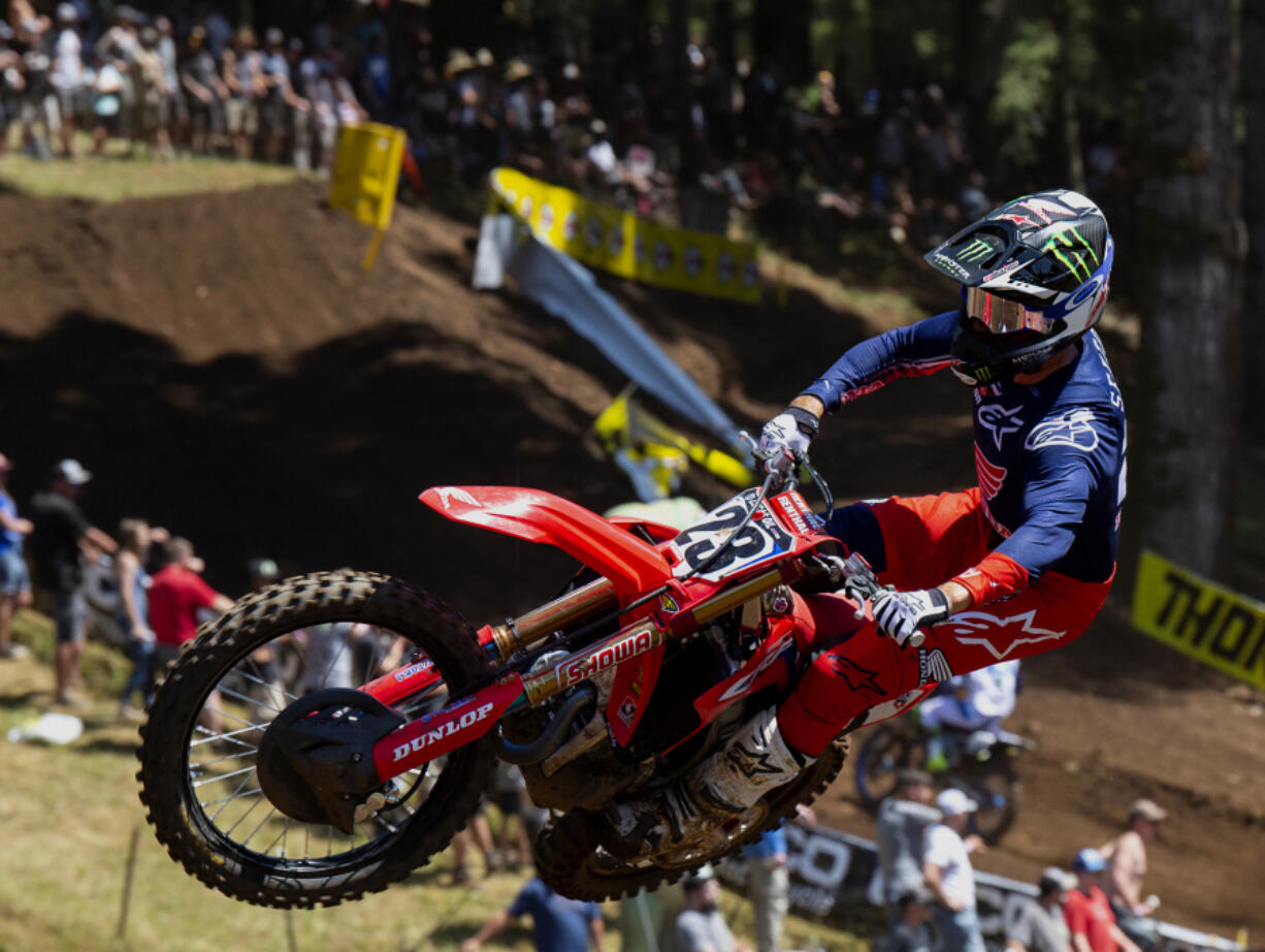 Chase Sexton adds some flair to the jump at Turn 18 on his way to victory in the 450 class Moto 1 at the Washougal National on Saturday, July 24, 2021 at Washougal MX Park. Chase Sexton won the 450 class and Jeremy Martin was victor of the 250 class in the seventh round of the Lucas Oil Pro Motocross Championships.
