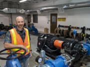 Tyler Clary, manager for water systems/water engineering for the city of Vancouver's water utility, oversees a staff of eight employees. All of them help to maintain operations at Water Station 1.