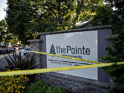 Law enforcement officers investigate the fatal shooting of Clark County sheriff's Detective Jeremy Brown at The Pointe Apartments on Friday evening.