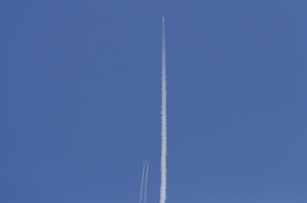 The Virgin Galactic rocket plane is released by the mothership heading to space with founder Richard Branson on board seen from Spaceport America near Truth or Consequences, N.M., Sunday, July 11, 2021.