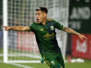 Portland Timbers forward Filipe Mora celebrates his header for a goal in extra time to give the Timbers a 2-1 win over Los Angeles FC in an MLS soccer match Wednesday, July 21, 2021, in Portland, Ore.