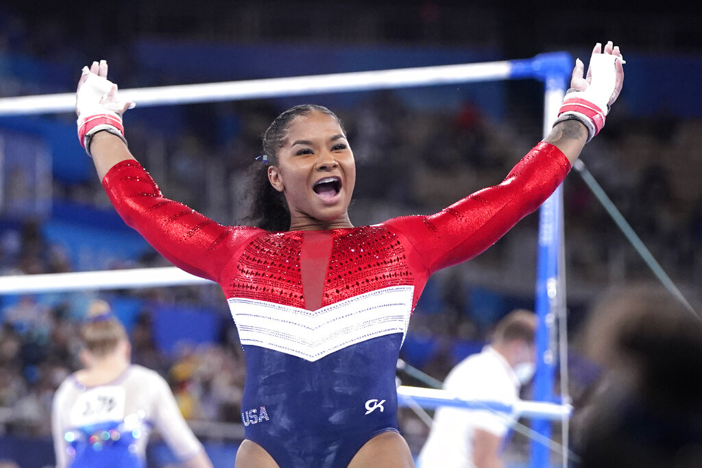 Jordan Chiles, of the United States, celebrates her performance on the uneven bars during the artistic gymnastics women's final at the 2020 Summer Olympics, Tuesday, July 27, 2021, in Tokyo.