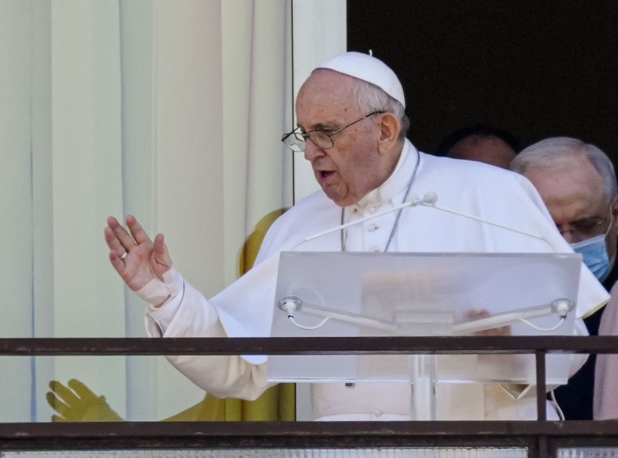 Pope Francis appears on a balcony of the Agostino Gemelli Polyclinic in Rome, Sunday, July 11, 2021, where he is recovering from intestinal surgery, for the traditional Sunday blessing and Angelus prayer. Pope Francis is 84 and had a part of his colon removed a week ago.