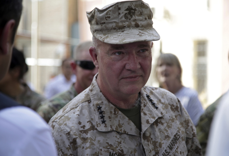 Marine Gen. Frank McKenzie, the head of U.S. Central Command, attends at a ceremony where Gen. Scott Miller, who has served as America's top commander in Afghanistan since 2018, handed over command, at Resolute Support headquarters, in Kabul, Afghanistan, Monday, July 12, 2021. The United States is a step closer to ending a 20-year military presence that became known as its "forever war," as Taliban insurgents continue to gain territory across the country.