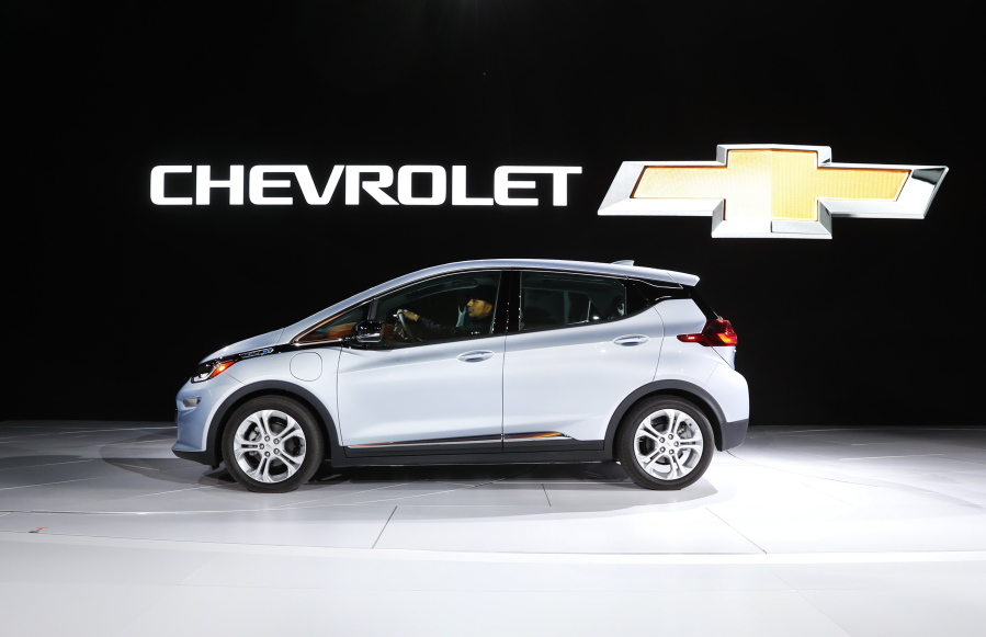FILE - In this Jan. 9, 2017 file photo the Chevrolet Bolt is on display at the North American International Auto Show in Detroit.  General Motors is recalling some older Chevrolet Bolts, Friday, July 23, 2021, for a second time to fix persistent battery problems that can set the electric cars ablaze.  The recall covers about 69,000 Bolts worldwide from 2017, 2018 and part of the 2019 model year.