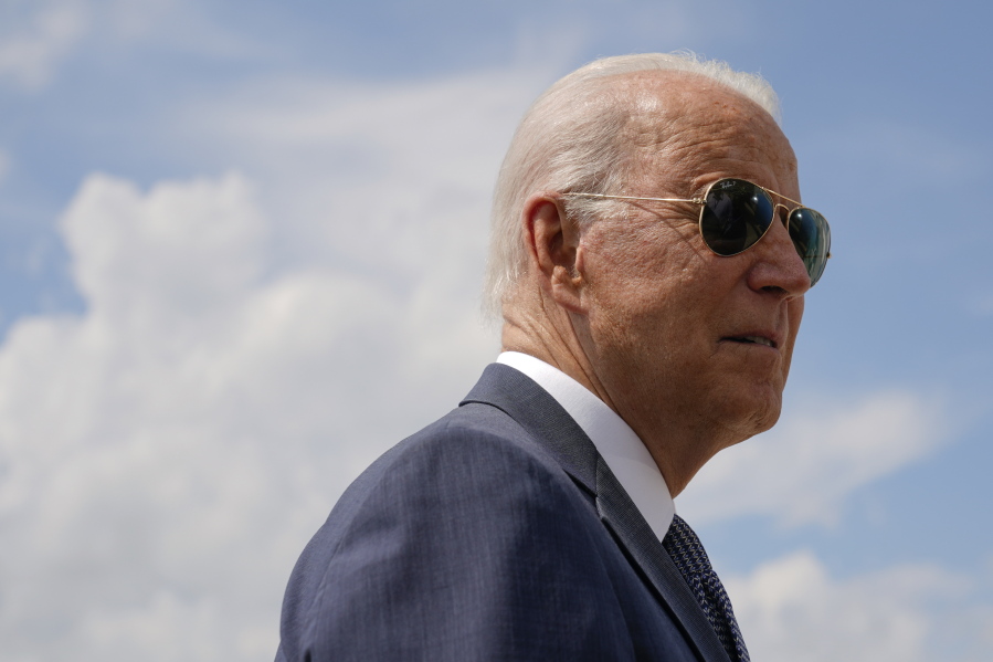 President Joe Biden speaks with members of the press before boarding Air Force One, Friday, July 9, 2021, at Andrews Air Force Base, Md. Biden is spending the weekend at his home in Delaware.