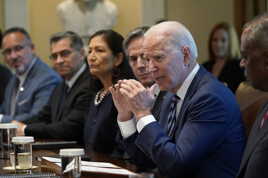 President Joe Biden speaks during a meeting with his Cabinet in the Cabinet Room at the White House in Washington, Tuesday, July 20, 2021. From left, Secretary of Education Miguel Cardona, Secretary of Health and Human Services Xavier Becerra, Secretary of the Interior Deb Haaland, Secretary of State Antony Blinken, Biden and Secretary of Defense Lloyd Austin.
