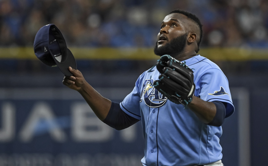 Tampa Bay Rays closer Diego Castillo reacts after the final out of a win over the Toronto Blue Jays during a baseball game Saturday, July 10, 2021, in St.