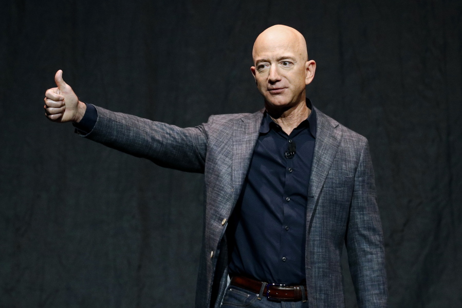 FILE - In this Thursday, May 9, 2019, file photo, Jeff Bezos speaks at an event before unveiling Blue Origin's Blue Moon lunar lander, in Washington. On Monday, July 12, 2021, the Federal Aviation Administration approved Blue Origin's attempt to launch people into space.