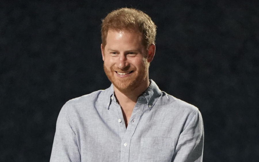 FILE - Prince Harry, Duke of Sussex, speaks at "Vax Live: The Concert to Reunite the World" on May 2, 2021, in Inglewood, Calif. Harry is writing what his publisher is calling an "intimate and heartfelt memoir." Random House announced on Monday, July 19, 2021, that the book, currently untitled, is expected to come out late in 2022.