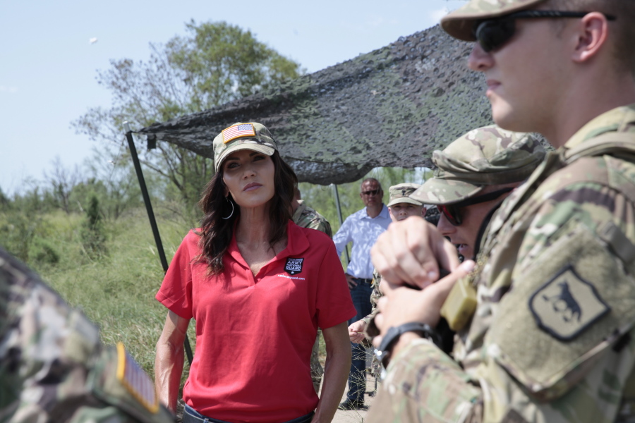 South Dakota Gov. Kristi Noem visits the U.S. border with Mexico on Monday, July 26, 2021, near McAllen, Texas. The Republican governor deployed roughly 50 National Guard troops to help with Texas' push to arrest people crossing illegally and charge them with state crimes.