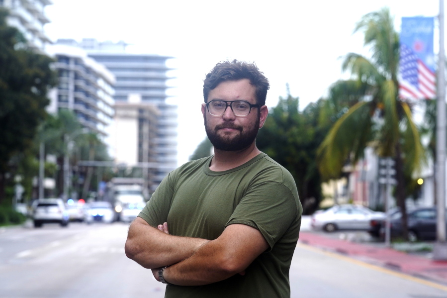 Ryan Mermer stands near his apartment in the historic section of Surfside, Fla., Tuesday, June 29, 2021. Mermer moved back from Palm Beach County to be near his parents and to be part of an active Jewish community.