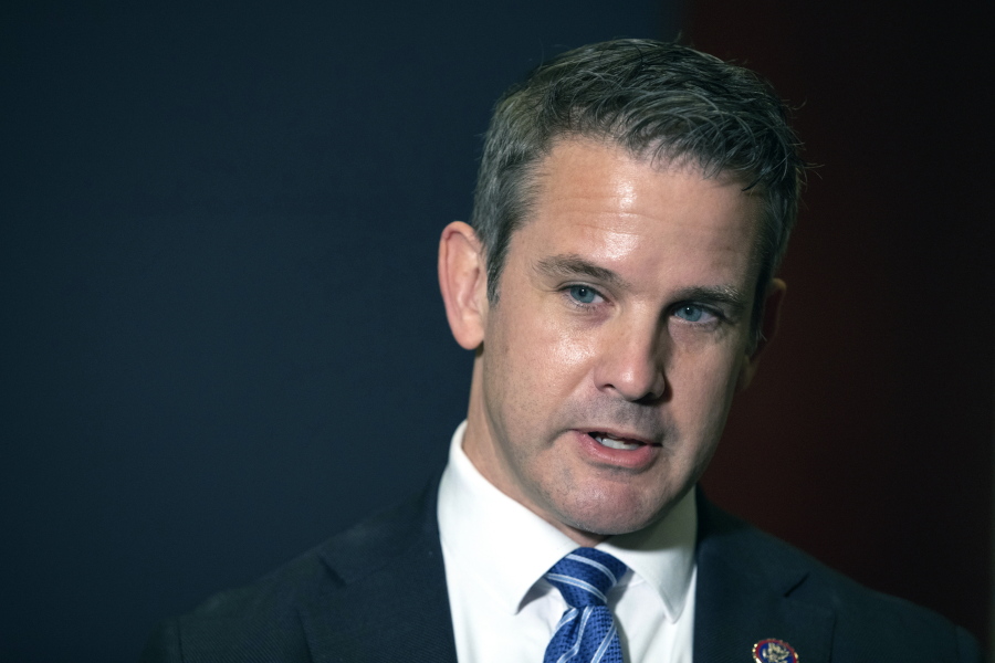 FILE - In this May 12, 2021 file photo, Rep. Adam Kinzinger, R-Ill., speaks to the media at the Capitol in Washington. House Speaker Nancy Pelosi said Sunday, July 25 she intends to name Kinzinger to a congressional committee investigating the violent Jan. 6 Capitol insurrection, pledging that the panel will "find the truth" even as the GOP threatens to boycott the effort.