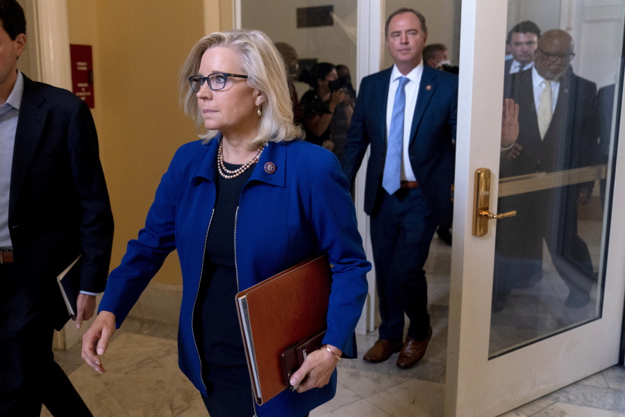 From left, Rep. Liz Cheney, R-Wyo., Rep. Adam Schiff, D-Calif., and Chairman Rep. Bennie Thompson, D-Miss., leave a House select committee hearing on the Jan. 6 attack on Capitol Hill in Washington, Tuesday, July 27, 2021.