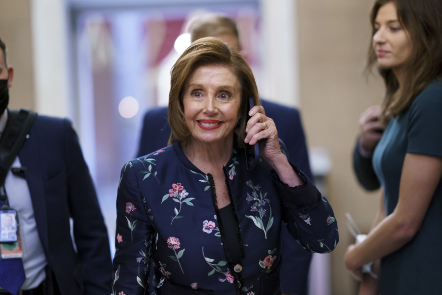 Speaker of the House Nancy Pelosi, D-Calif., returns to her office where members of the House select committee on the January 6th attack on the Capitol are preparing for the start of hearings next week, at the Capitol in Washington, Thursday, July 22, 2021. (AP Photo/J.