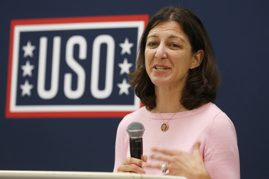 FILE - In this Oct. 4, 2019, file photo Rep. Elaine Luria, D-Va., speaks to participants in a USO Pathfinder program in Virginia Beach, Va.  Luria has built a reputation as pro-military and proud moderate in one of the nation's most Navy- and Defense Department-dependent swing districts. But she's also agreed to join a House committee investigating the deadly Jan. 6 insurrection at the U.S. Capitol, which could raise uncomfortable questions about links between the military and extremist groups and test her centrist credentials.
