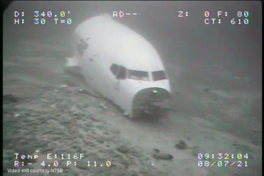 In this July 8, 2021 image from video provided by Sea Engineering, Inc. via the National Transportation Safety Board, the jet cabin from Transair Flight 810 rests on the Pacific Ocean floor off the coast of Honolulu, Hawaii. The Federal Aviation Administration said Friday, July 16,  that it will bar Rhoades Aviation of Honolulu from flying or doing maintenance inspections until it meets FAA regulations. The decision to ground the carrier, which operates as Transair, is separate from the investigation into the July 2 ditching of a Boeing 737, the FAA said.