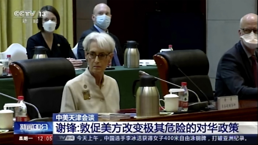 In this image taken from a video footage run by China's CCTV via AP Video, U.S. Deputy Secretary of State Wendy Sherman, front left, and her delegation meet Chinese counterpart in Tianjin, China Monday, July 26, 2021. China blamed the U.S. for what it called a "stalemate" in bilateral relations as high-level face-to-face talks began Monday.