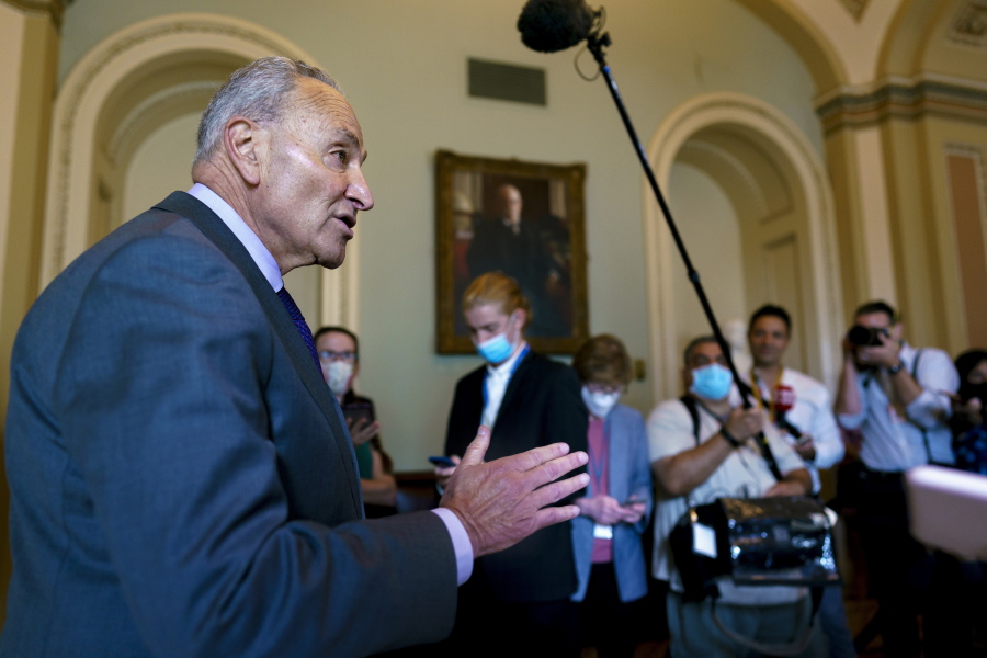 Senate Majority Leader Chuck Schumer, D-N.Y., updates reporters on the infrastructure negotiations between Republicans and Democrats, at the Capitol in Washington, Wednesday, July 28, 2021. (AP Photo/J.