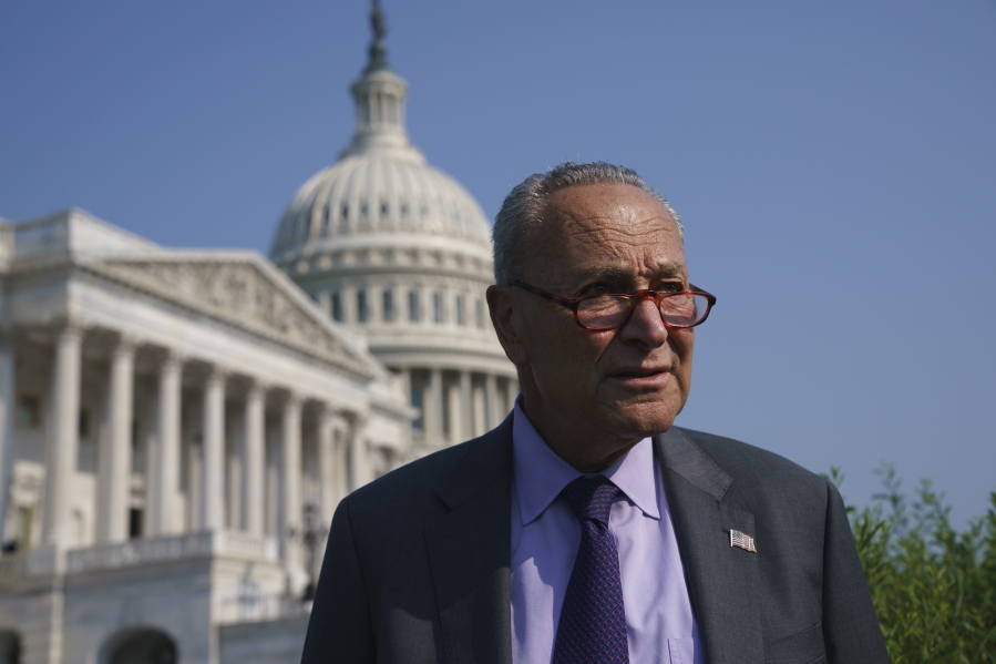 Senate Majority Leader Chuck Schumer, D-N.Y., arrives to meet with Speaker of the House Nancy Pelosi, D-Calif., before an event to promote investments in clean jobs, at the Capitol in Washington, Wednesday, July 28, 2021. (AP Photo/J.