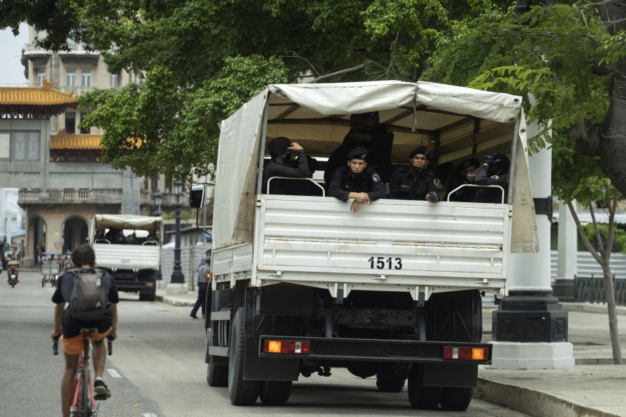A truck of special forces police sits parked outside National Capitol building in Havana, Cuba, Wednesday, July 14, 2021, days after protests. Demonstrators voiced grievances on Sunday against goods shortages, rising prices and power cuts, and some called for a change of government.