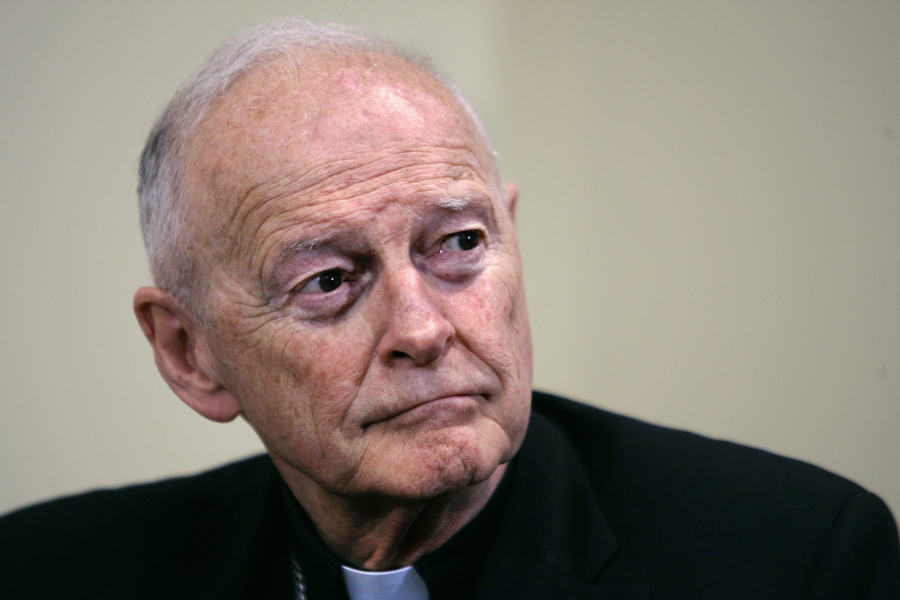 FILE -  In this May 16, 2006 file photo former Washington Archbishop, Cardinal Theodore McCarrick pauses during a press conference in Washington. McCarrick, the once-influential American cardinal who was defrocked after a Vatican investigation confirmed he had sexually molested adults as well as children, has been charged with sexually assaulting a 16-year-old boy during a wedding reception at Wellesley College in the 1970s, court records show. (AP Photo/J.