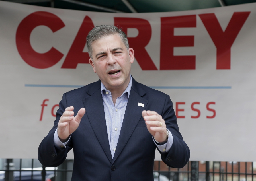 In this June 1, 2021 photo, Mike Carey, speaks at the kick-off of his 15th Congressional District campaign in Grove City, Ohio. Former President Donald Trump has backed Carey, a longtime coal lobbyist, as one of the candidates in the crowded Republican primary for an open U.S. House seat in central Ohio. (Barbara J.