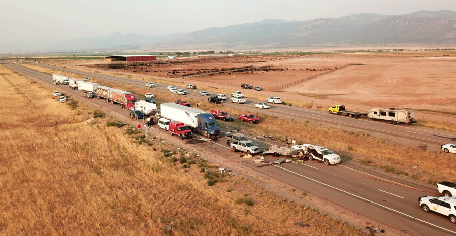 This photo provided by the Utah Highway Patrol and posted on the Utah Department of Public Safety website shows the scene of a fatal pileup, Sunday, July 25, 2021, on Interstate 15 in Millard County, near the town of Kanosh, Utah.
